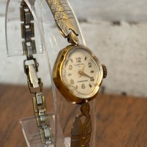 Vintage Gold and Silver Clinton Watch